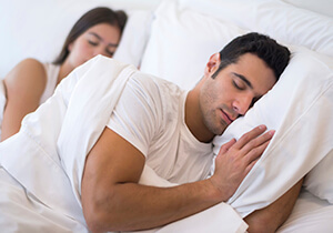 man sleeping soundly, without snoring