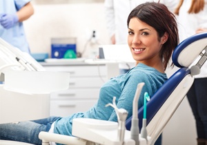 Smiling woman in the dental chair 