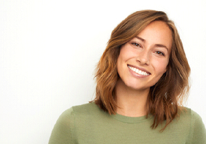 Smiling woman in a green shirt 