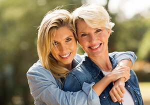 daughter hugging her mother