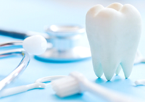 Variety of dental instruments on a blue background 