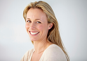 woman with long hair, smiling