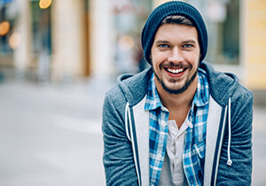 man wearing jacket during winter