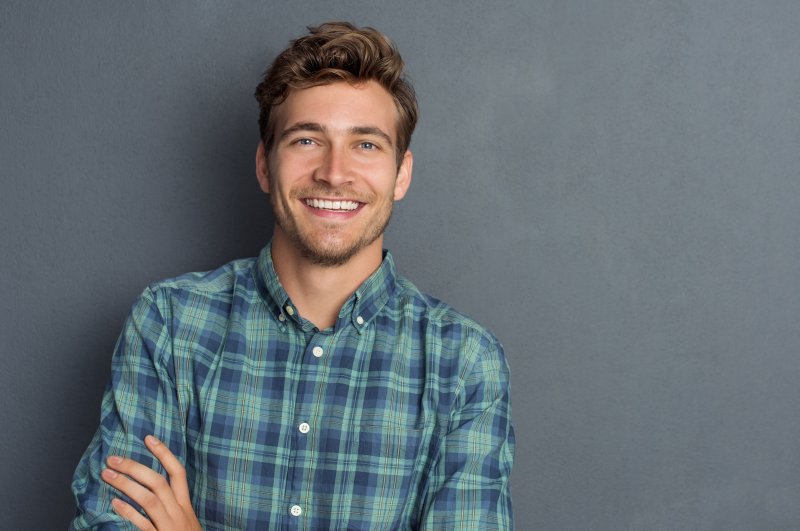 a young man smiling