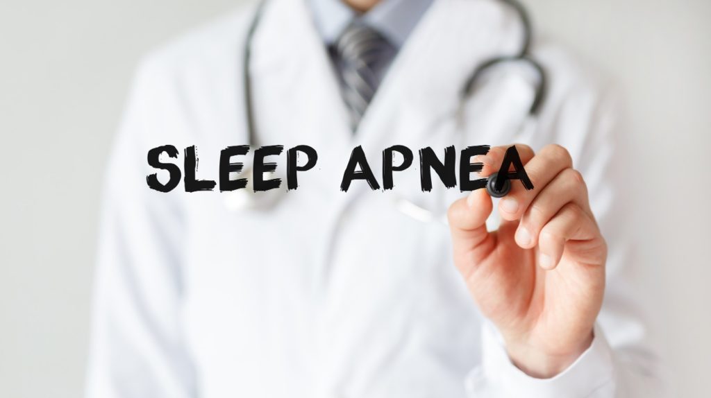 Doctor writing sleep apnea